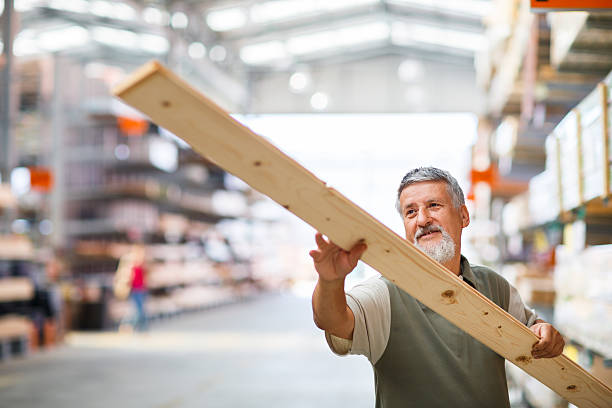 istock Senior man buying construction wood in a  DIY store 499027549