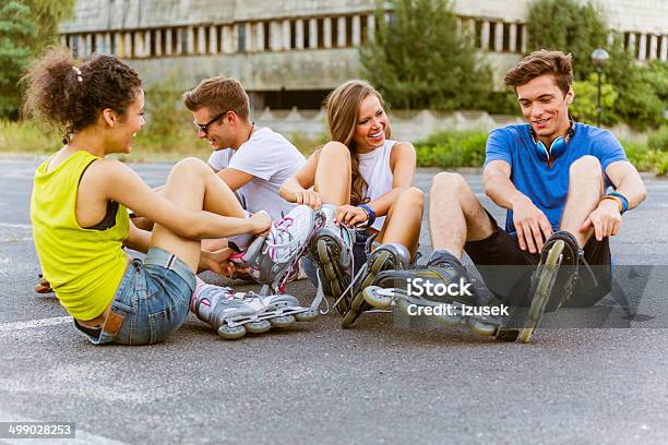 Young People On Rollerblades Stock Photo - Download Image Now - 20-24 Years, Activity, Adult