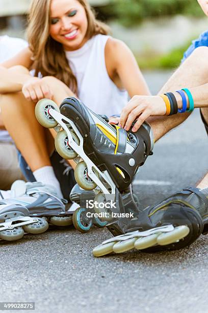 Young People On Rollerblades Stock Photo - Download Image Now - 20-24 Years, Activity, Adult