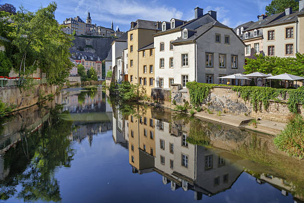 istock Old houses reflecting Alzette river 499028455