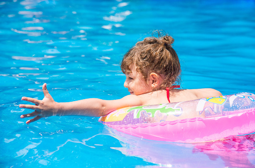 Sweet little girl with pink circle swims in the pool https://leto44e.storage.yandex.net/rdisk/a3bc6aed33b7e256c509dcfd55d8e238/mpfs/ehD7ZJGsW7uLw6pe08Gq4n6c4Ulk82viKa6jYiCHm6rlBB8T5YbUercRmjhKT2vCoWwjFVLbP4Y199QLCV9PvQ==?uid=0&filename=hb1.jpg&disposition=inline&hash=&limit=0&content_type=image%2Fjpeg&rtoken=01c1828ce731265c85b182d6bb4099cf&rtimestamp=54bd612d&force_default=no