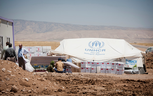Kurdistan Iraq - June 22, 2014: IDP camp 15 km from Mosul and it is set up on an empty field. This camp collects people from the region of Mosul after the ISIS invated the city.