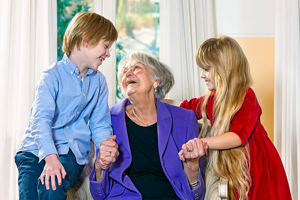 istock Grandchildren visiting their elderly grandmother. 499029901
