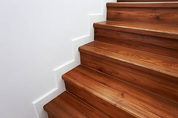 istock wooden staircase in a white modern house 499030479