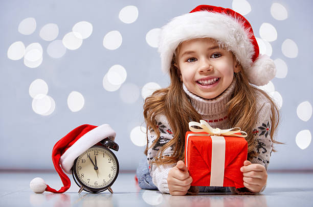 istock child in a Christmas hat 499031190