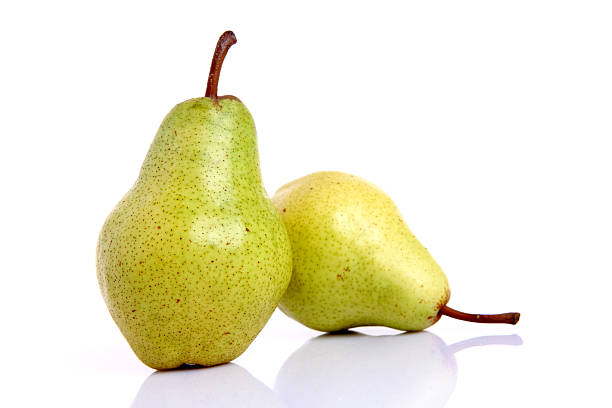 pears pears on white background bartlett pear stock pictures, royalty-free photos & images