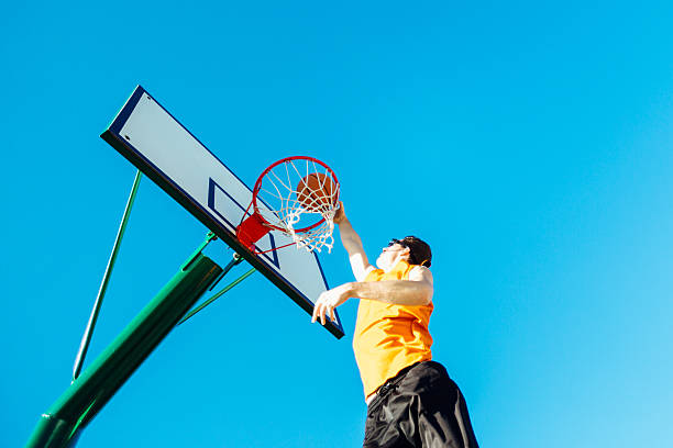 istock Basketball player going in the hoop. 499031562