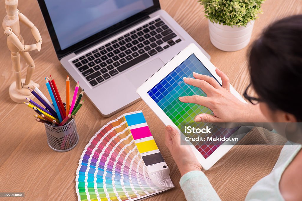 Graphic Designer Modern designer workplace. Concept of design working office. Modern workplace office Service Stock Photo