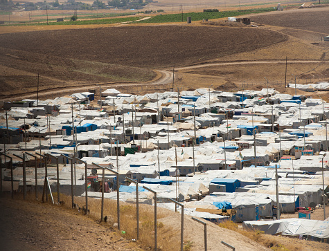 Kurdistan Iraq - June 22, 2014: Camp with syrian refugees 10 km from Erbil. It contains 3.200 tents with refugees. It is set up through the UN