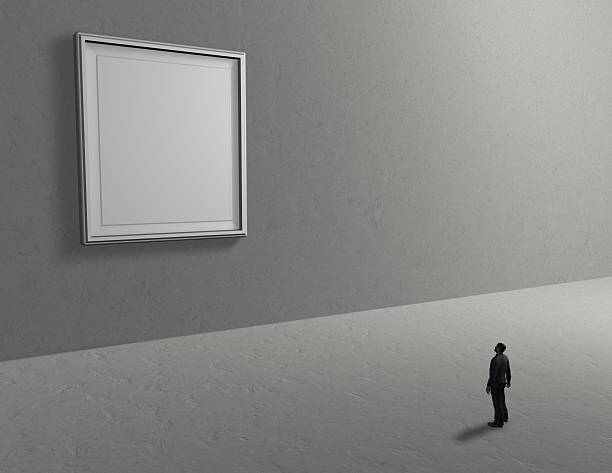 istock empty room background with person and blank picture frame 499032623