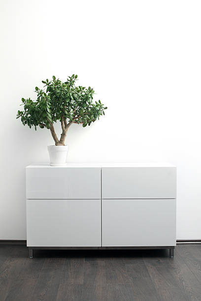 istock white chest of drawers in bright interior 499034473