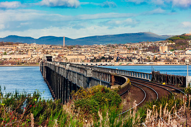 Tay Rail Bridge, Dundee, Scotland Tay Rail Bridge looking along its length towards the city of Dundee, Scotland. Processed in AdobeRGB colorspace. estuary photos stock pictures, royalty-free photos & images