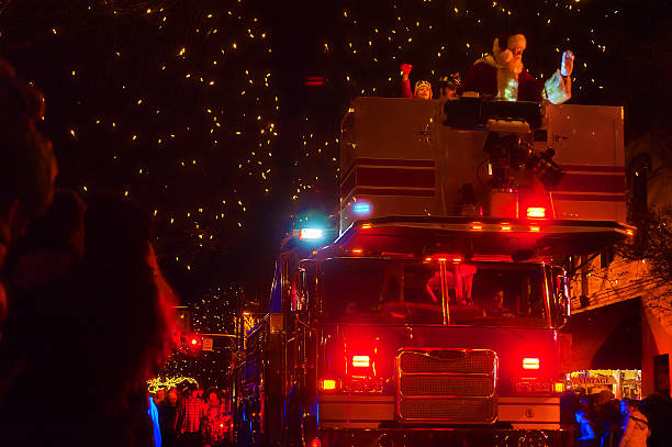 McMinnville, Oregon,USA- November 27, 2015: Santa rides on top of Fire truck in the Annual McMinnville, Oregon Christmas Parade.