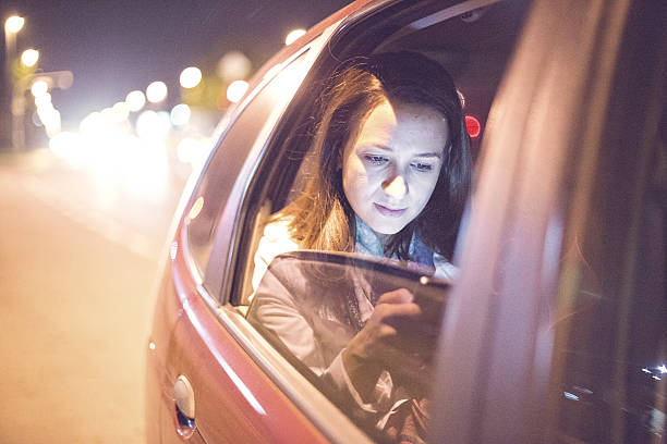 istock Woman on the phone in the cab 499047684