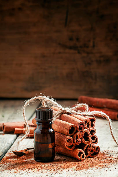 istock Essential cinnamon oil in a small bottle 499049718