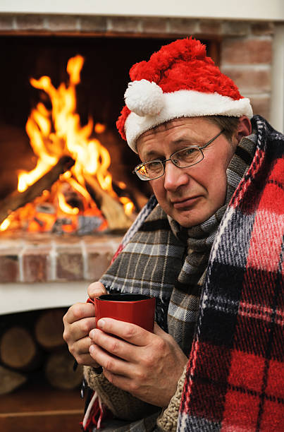 istock Man in warm clothing with cup 499051994