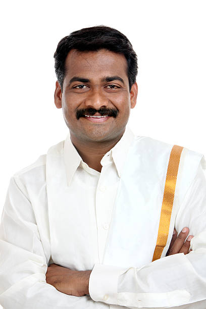 istock Smart smiling young traditional young man hands crossed 499053212