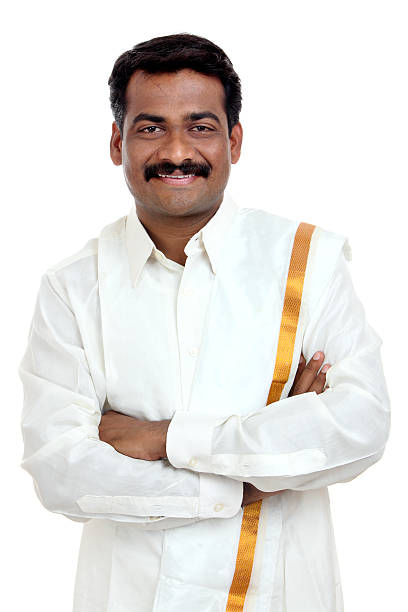 istock Smart smiling young traditional young man hands crossed 499053264