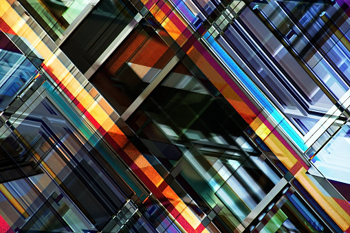 Digitally rendered diagonal composition of modern building facades with glazed aluminum structures. Fragment of generalized street view. Glance at modern business city.