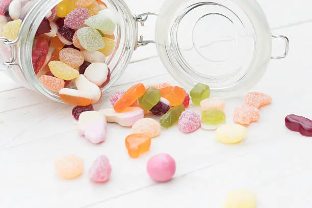 Photo of Candies spilled from a jar
