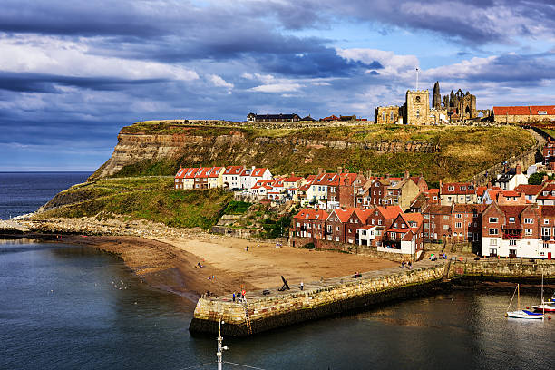 Whitby pier inlet is where boats of all types enter and exit the town's harbour to anchor and offload or onload goods and passengers.