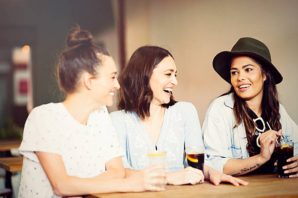 istock Girlfriends in pub enjoying to stay together 499056738