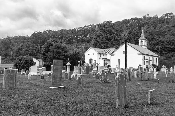 istock Old Church Building And Cemetery In B & W 499057315