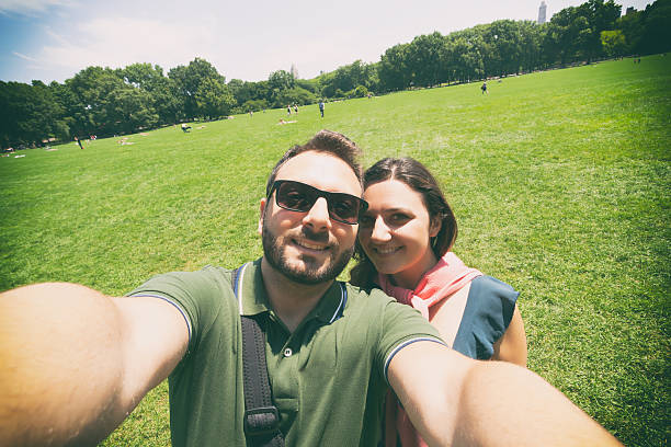 istock Couple makes a selfie in Central Park in NYC 499058098