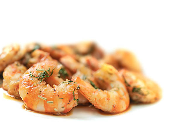 istock Fried black tiger prawns with herbs and spices 499059778
