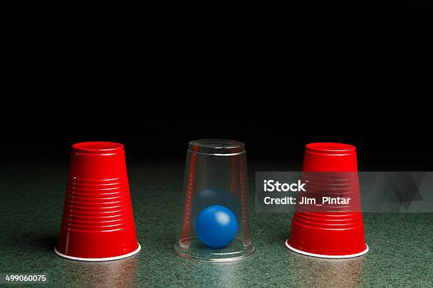 Blue Ball Hidden Under Clear Cup Stock Photo - Download Image Now - Shell Game, Assistance, Award