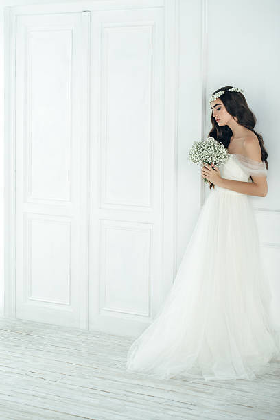 istock Studio shot of young beautiful bride 499060088