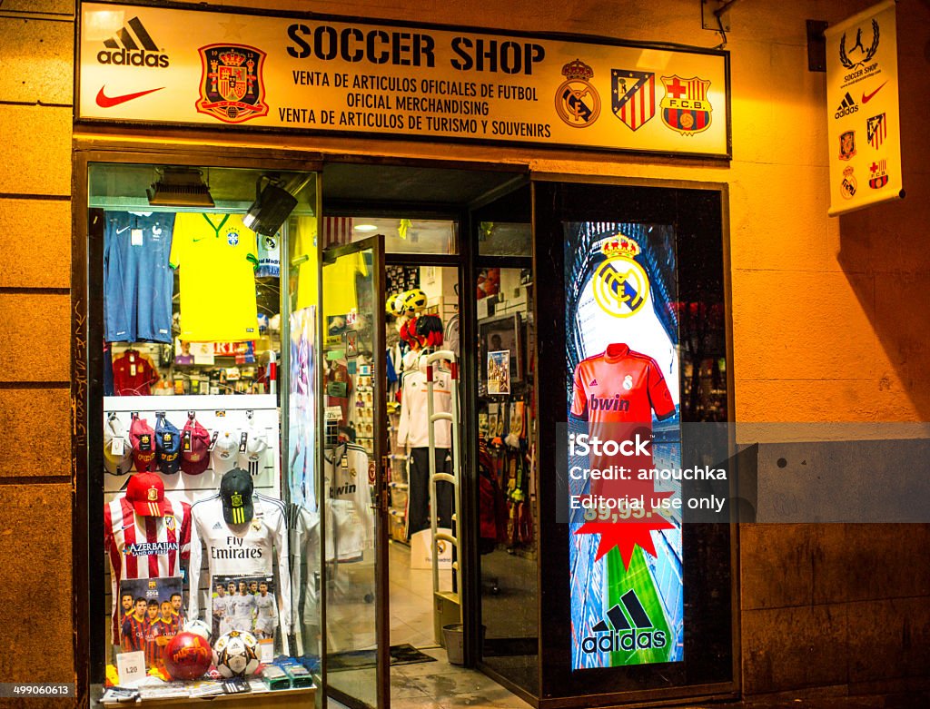 Soccer Shop in Madrid, Spain Madrid, Spain  - December 24, 2013: Soccer Shop in Madrid, Spain, selling gifts, mascots, souvenirs and clothing for football fans.  Business Finance and Industry Stock Photo