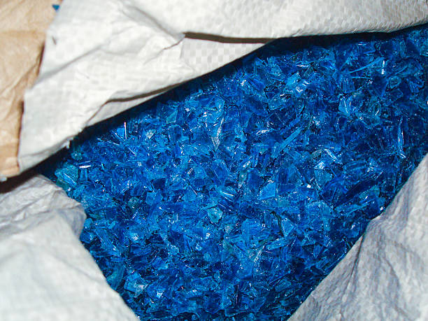 Recycled and Crushed Plastic for Polycarbonate Sheet Production stock photo