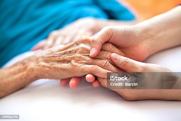 Helping The Needy Stock Photo - Download Image Now - Senior Adult, Care, Home Caregiver
