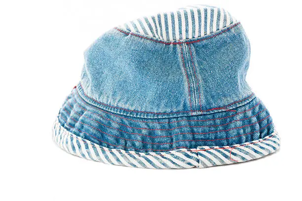 Blue fabric hat on white.