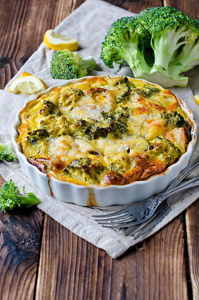 Casserole with broccoli and fish Casserole with broccoli and fish seafood gratin stock pictures, royalty-free photos & images