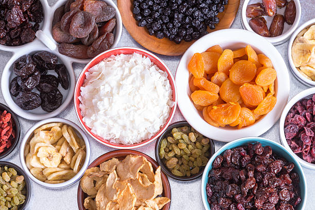 istock Assortment of dried fruit in individual dishes 499084077