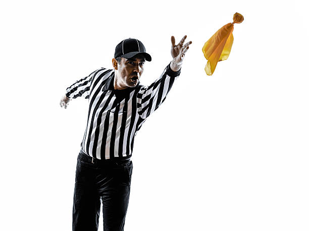 american football referee throwing yellow flag silhouette american football referee gestures in silhouette on white background referee stock pictures, royalty-free photos & images