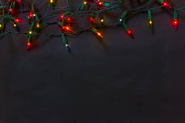 Christmas lights black background stock photo