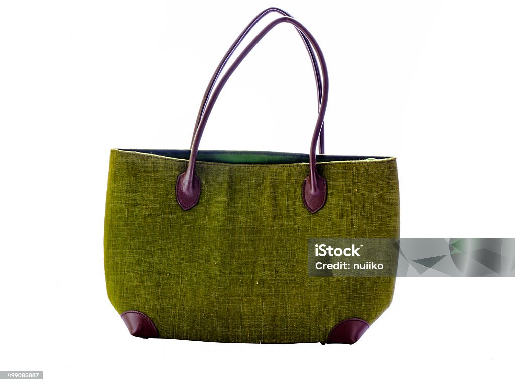 Green fabric handbag isolated on white. Arts Culture and Entertainment Stock Photo