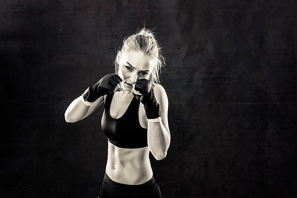 istock Women Fighter in a Stand Off In Black and White 499086086