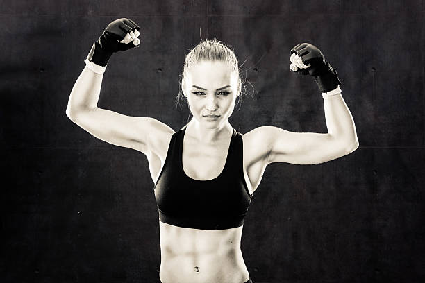 istock Mixed Martial Artist Celebrating a Victory In Black and White 499086196