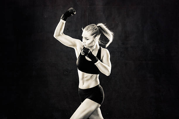 istock Women Fighter in a Stand Off In Black and White 499086276