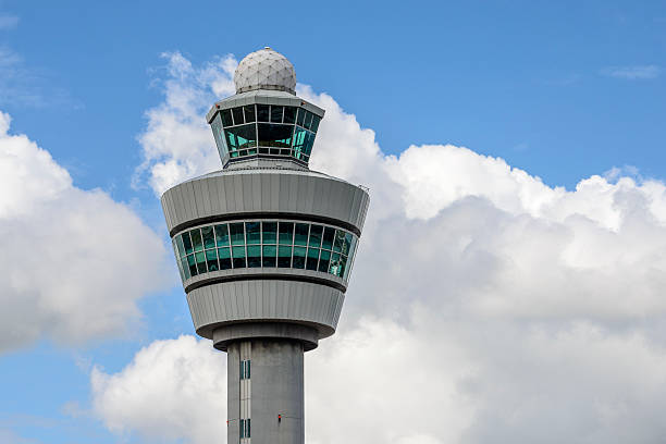 Air Traffic Control Tower Air traffic control tower at Schiphol Airport in The Netherlands. Amsterdam Airport Schiphol (AMS) is the main international airport of the Netherlands, and an international hub for several airline. It is one of the busiest airports in Europe. atc stock pictures, royalty-free photos & images