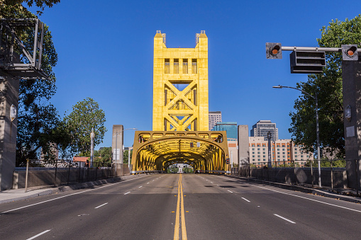 Historic Tower bridge leading towards the state capitol in Sacramento, California.