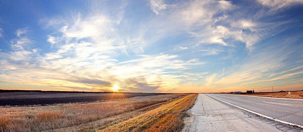 Prairie Sunset This image is taken on Canada's Highway One, just west of Winnipeg. An XXL panorama of many vertical exposures. manitoba photos stock pictures, royalty-free photos & images