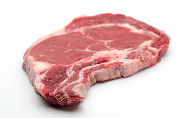 istock Rib eye on the bone Steak beef meat raw on white 499089768
