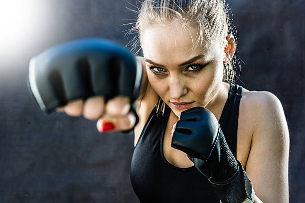 istock Women Fighter Punching Close Up 499089806