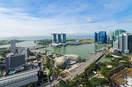 Singapore City, Singapore - February 2, 2023 : Sunrise view of Marina Bay area with the Marina Bay Sands Hotel, Art Science  Museum and Central Business District