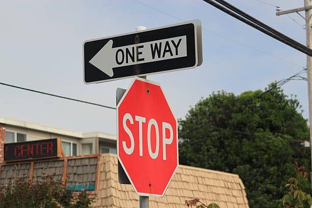 istock Street sign indicating One Way and Stop 499092364